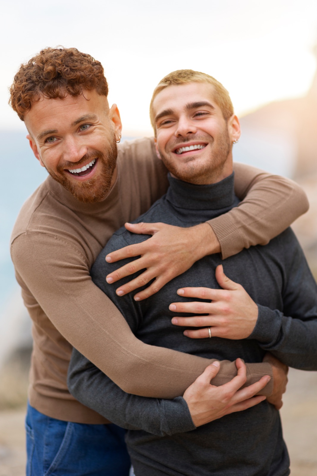 Two people embracing and smiling